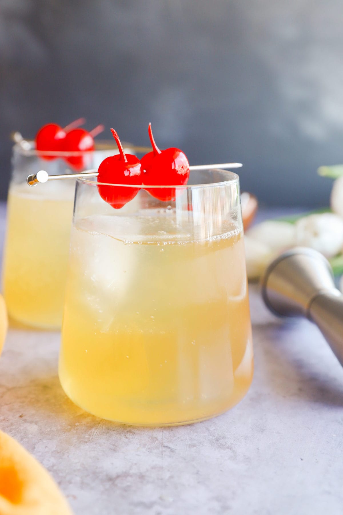 Side photo of cocktail made with lemon and whiskey